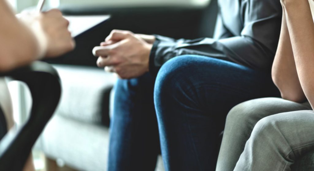 Hopeless and upset couple in therapy